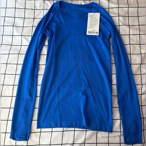 Lululemon Blue Long Sleeve Swiftly Tech, Size 4, Hip Length. NWT.